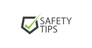 Gray upside down hexagon with a green checkmark with text saying "Safety Tips".